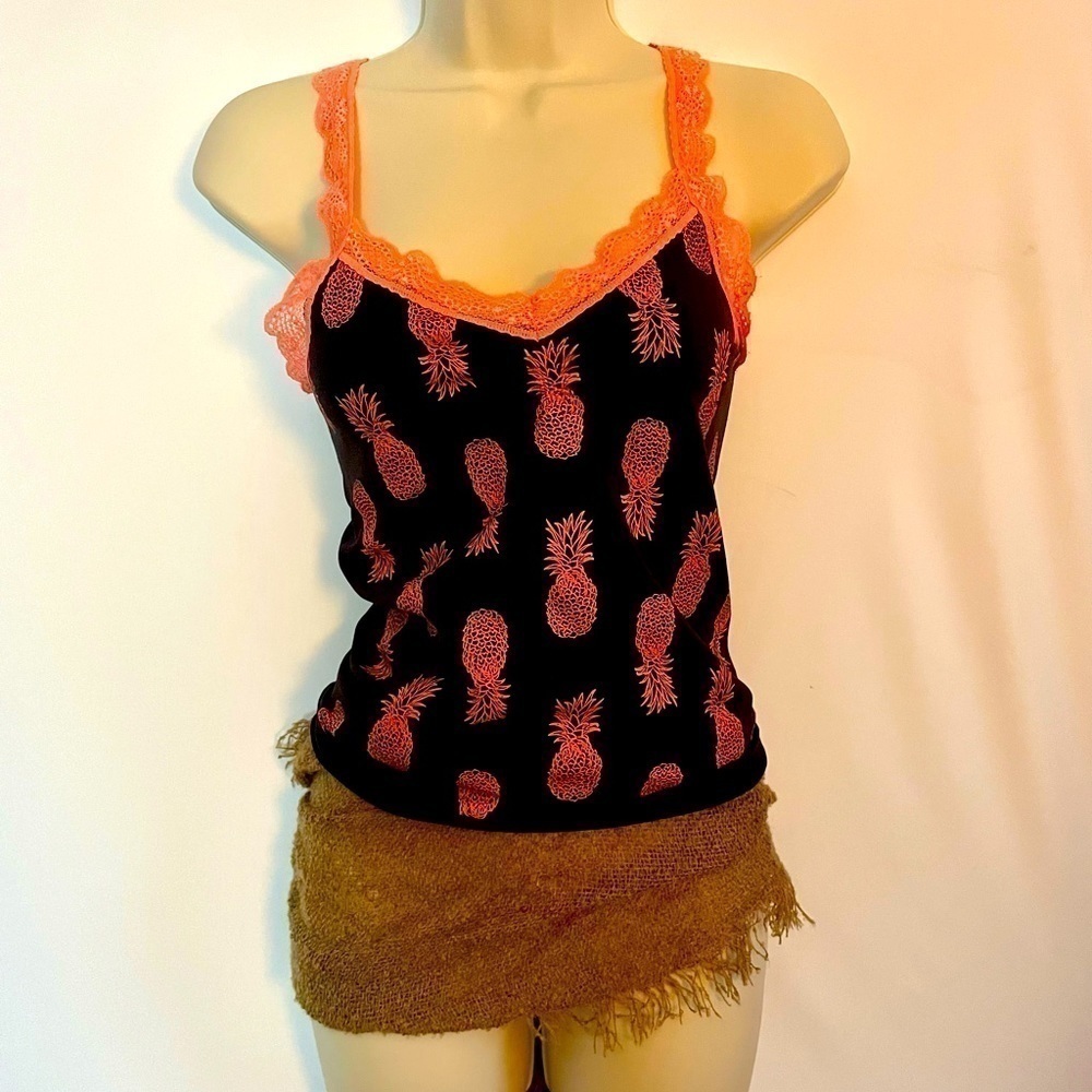 Black tank top with neon, orange, pineapples and lace